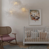 Affiche panda qui dort illustrée, accrochée dans une chambre d'enfant