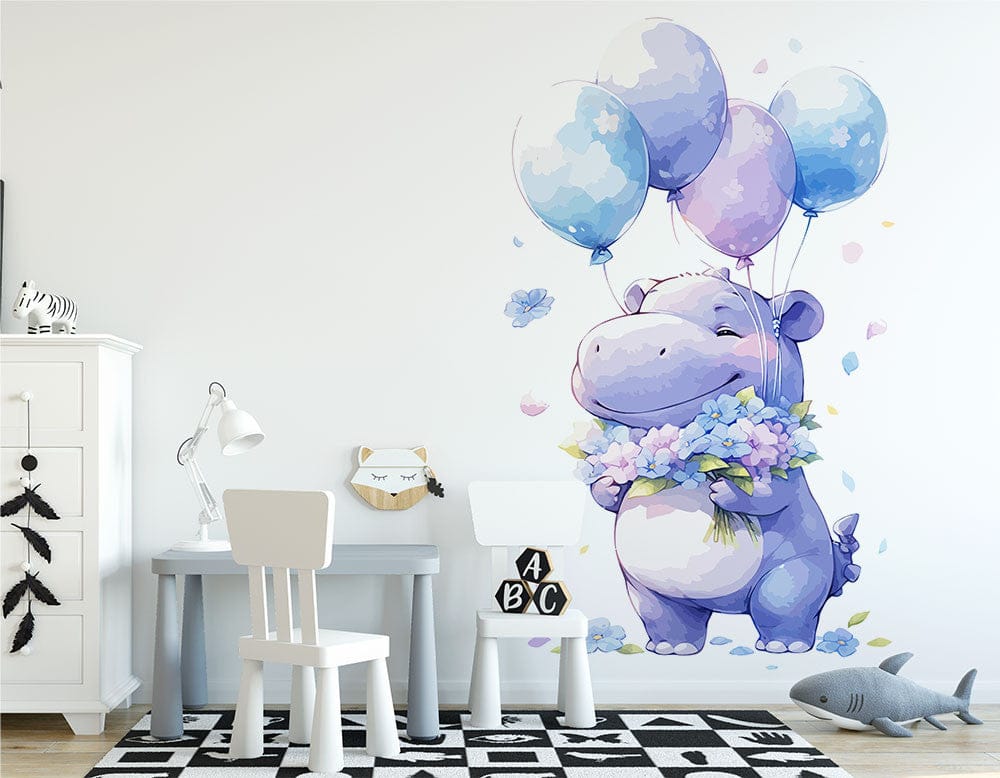 Deuxième vue du papier peint hippopotame avec ces ballons dans une chambre de bébé
