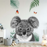 Deuxième vue du papier peint koala papillons dans une chambre d'enfant