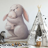 Deuxième vue du papier peint lapin maman câlin dans une chambre de bébé