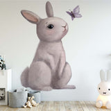 Deuxième vue du papier peint lapin papillon dans une chambre d'enfant