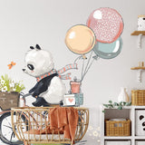 Deuxième vue du papier peint panda ballade à vélo dans une chambre d'enfant