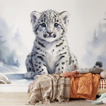 Papier peint panoramique panthère des neiges illustré, dans une chambre de bébé